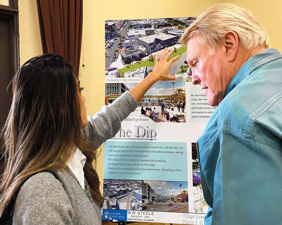 Hotel marketing executive Tracy Ly asks architect Jim Alcorn a question about The Dip, one of the areas included in La Jolla's Village Streetscape Plan.