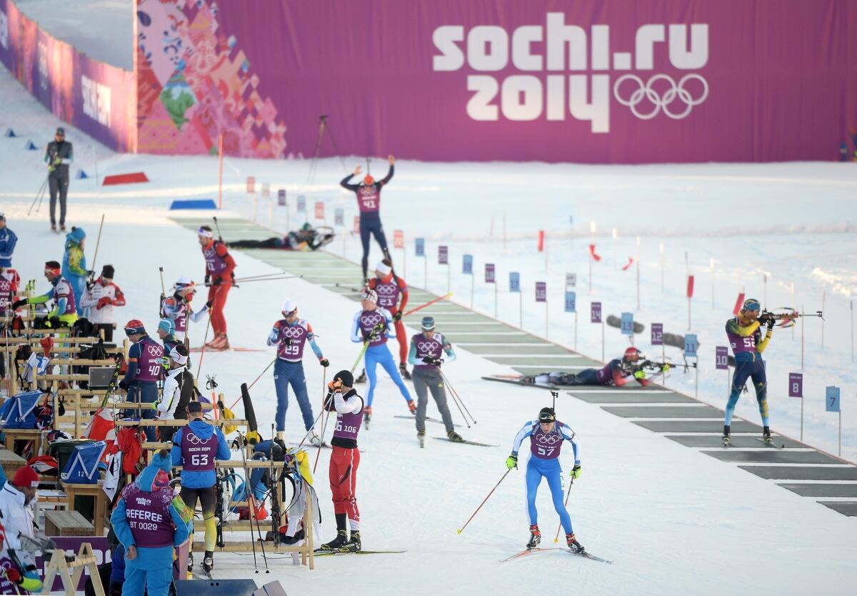 Biathletes train in Sochi, Russia. U.S. officials have urged Americans to be vigilant in Russia, but they haven't altered travel guidelines.