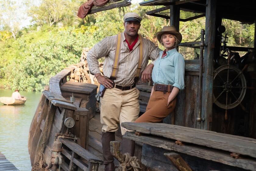 Dwayne Johnson and Emily Blunt in "The Jungle Cruise."