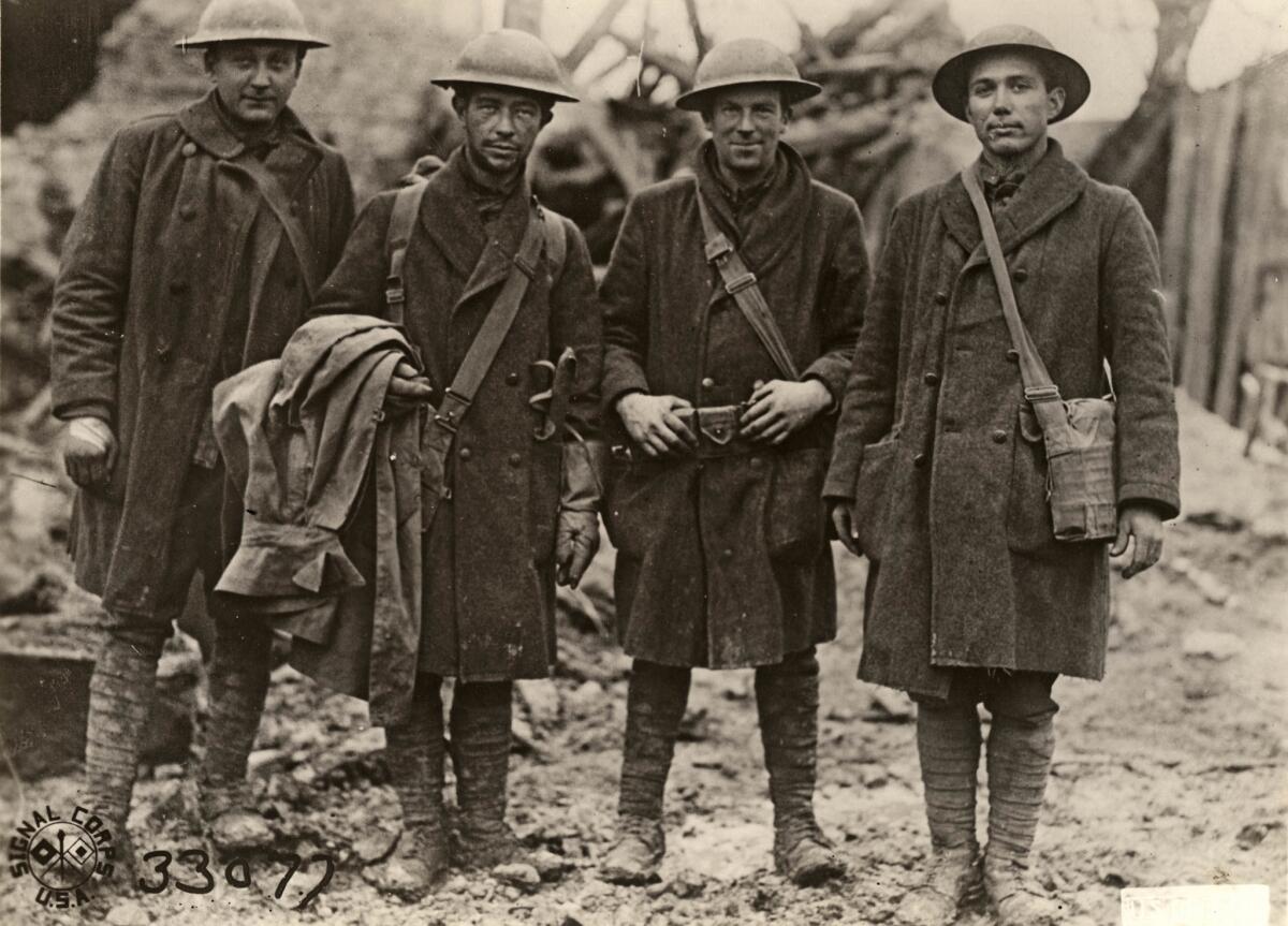 Nov. 11, 1918: Runners from the 79th Infantry Division's 315th Regiment spread the word to stop firing at 11 a.m. on the last day of World War I. From left are Pvt. William Wachter, Pvt. R. D. Thompson, Pvt. J. J. Mulcahy and Pvt. John McCaughtry.