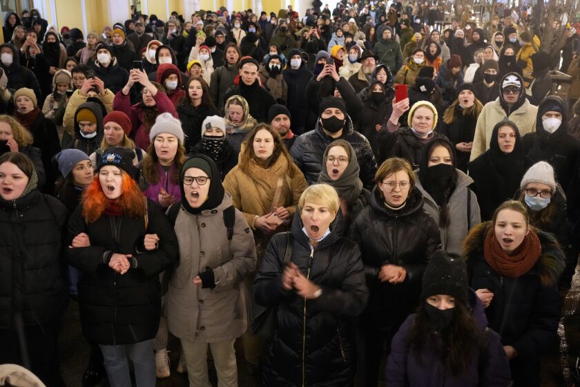 Demonstrators shout slogans in St. Petersburg, Russia, Friday, Feb. 25, 2022. Shocked Russians turned out by the thousands Thursday to decry their country's invasion of Ukraine as emotional calls for protests grew on social media. Some 1,745 people in 54 Russian cities were detained, at least 957 of them in Moscow. (AP Photo/Dmitri Lovetsky)