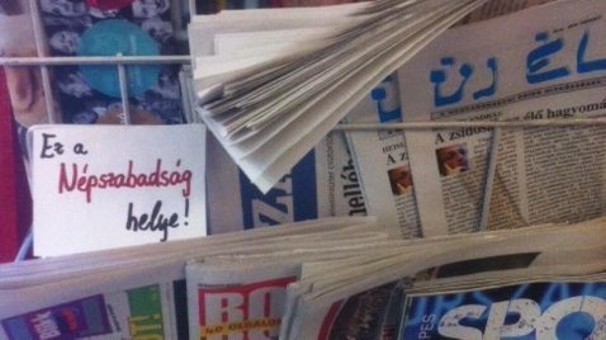 A note at a newsstand in Budapest, Hungary, shows the spot reserved for the shuttered newspaper Nepszabadsag.