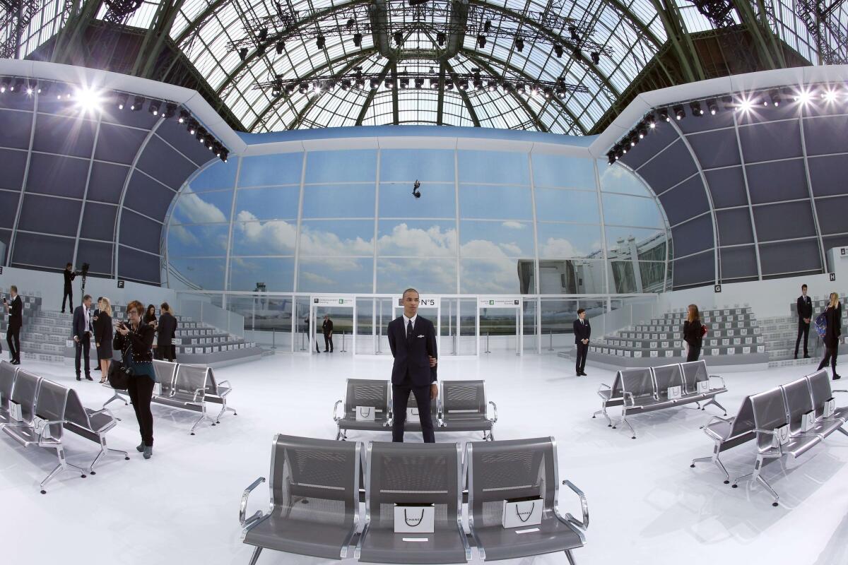 People wait before the Chanel 2016 Spring/Summer ready-to-wear collection fashion show, on October 6, 2015 at the Grand Palais in Paris. AFP PHOTO / FRANCOIS GUILLOTFRANCOIS GUILLOT/AFP/Getty Images ** OUTS - ELSENT, FPG, CM - OUTS * NM, PH, VA if sourced by CT, LA or MoD **