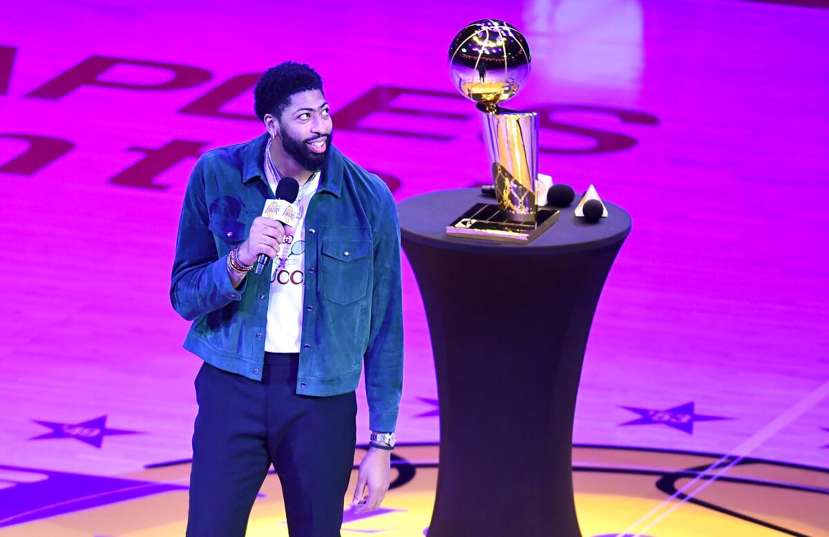 Lakers forward Anthony Davis speaks during the Lakers championship banner unveiling ceremony.