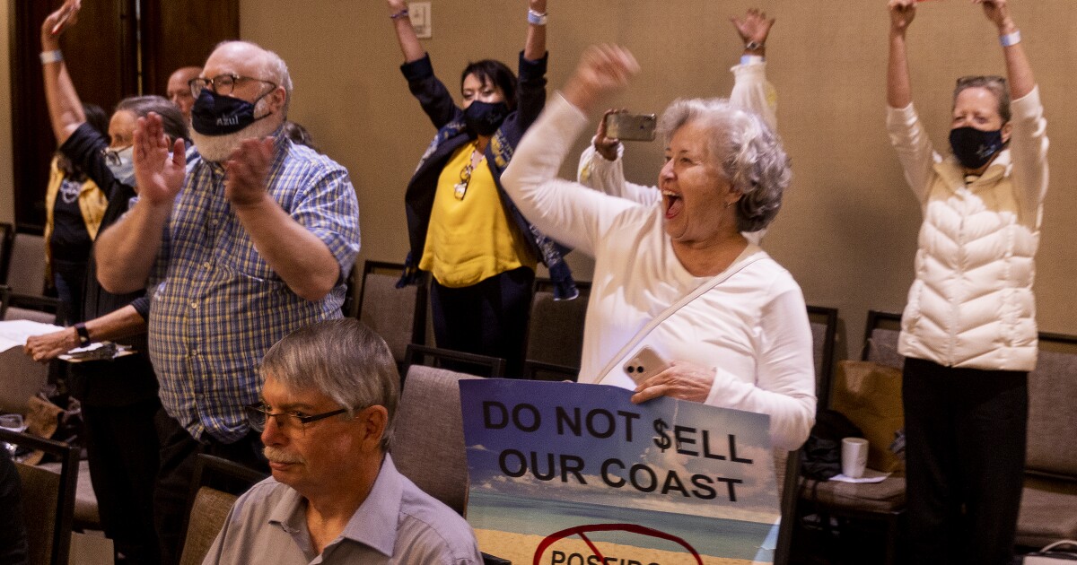 After hearing hours of heated debate, the California Coastal Commission voted against a controversial plan by the company Poseidon Water to build a hu