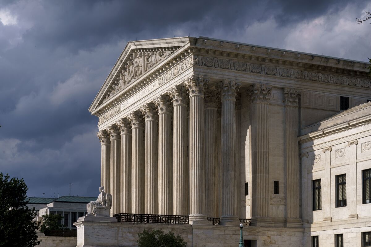 FILE - This June 8, 2021 file photo shows the Supreme Court building in Washington. The future of abortion rights is in the hands of a conservative Supreme Court that is beginning a new term Monday, Oct. 4, that also includes major cases on gun rights and religion. (AP Photo/J. Scott Applewhite, File)