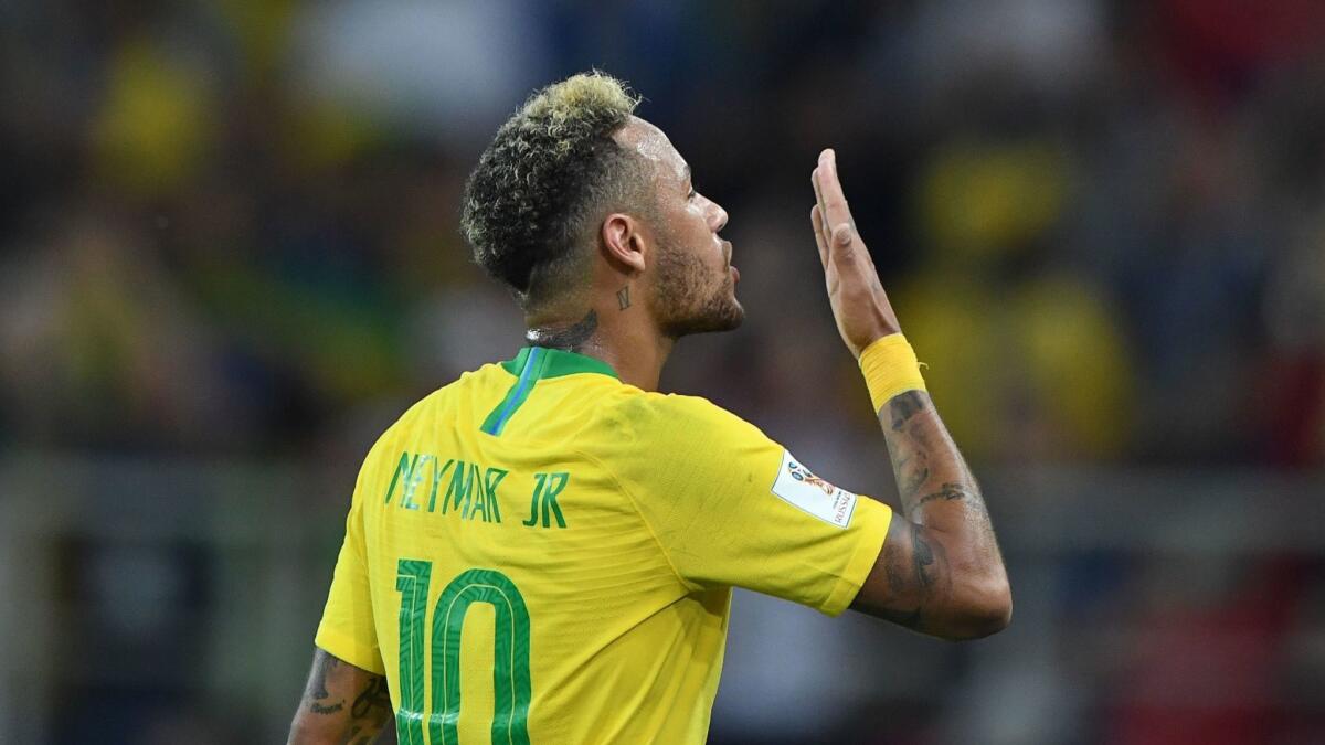 Brazil forward Neymar blows a kiss to the fans after a 2-0 defeat of Serbia on Wednesday at Spartak Stadium in Moscow.