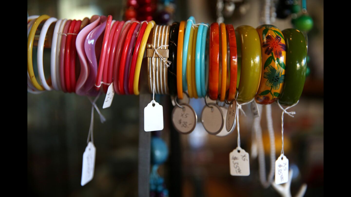 A colorful display of assorted bangles greets shoppers at inretrospect, one of the largest shops on East 4th Street on Retro Row in Long Beach. The shop carries a little bit of everything: clothing, records, housewares, furnishings, books, jewelry and mid-century styling.