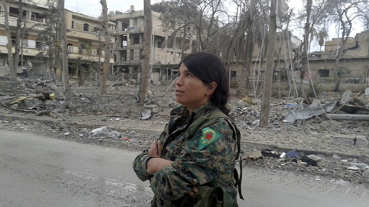 An Iraqi Kurdish commander who goes by the nom de guerre Klara Raqqah. She says the women who enlist are often driven by a desire to avenge the wrongs done by Islamic State to women.