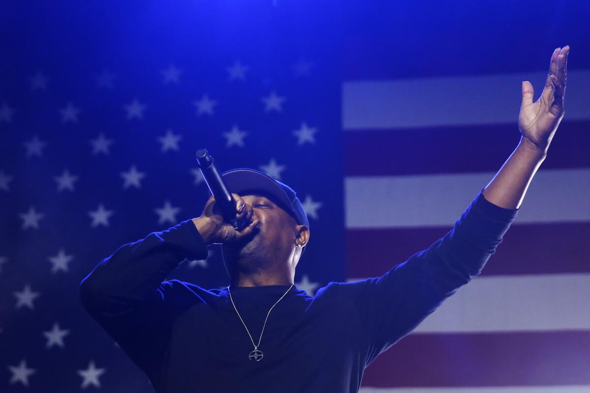 Man lasting successful beforehand of an American emblem w/ a microphone
