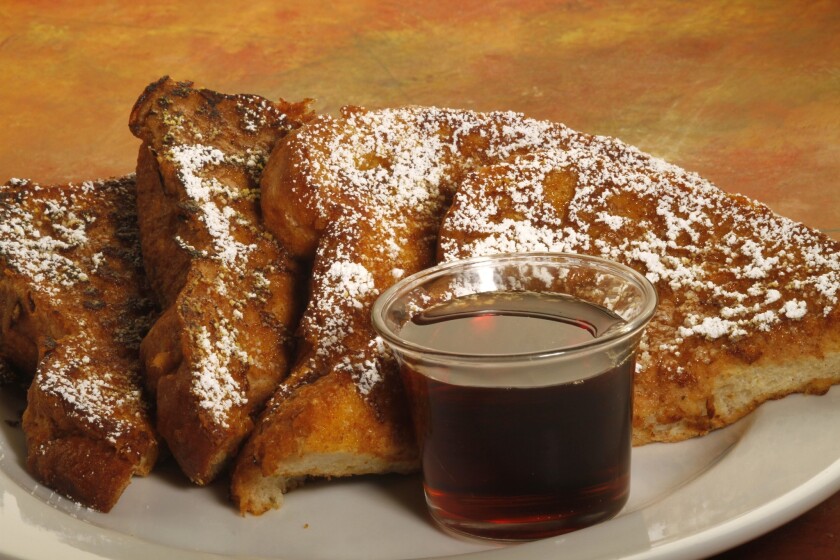 Pumpkin-spiced French toast with maple syrup.