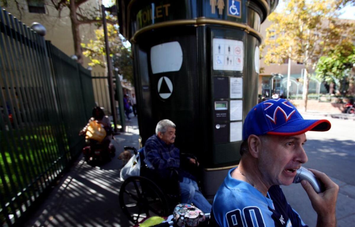 A top Los Angeles city official released a proposal Monday that would expand bathroom access and storage facilities for homeless people on skid row. Above, a self-cleaning toilet in the neighborhood.