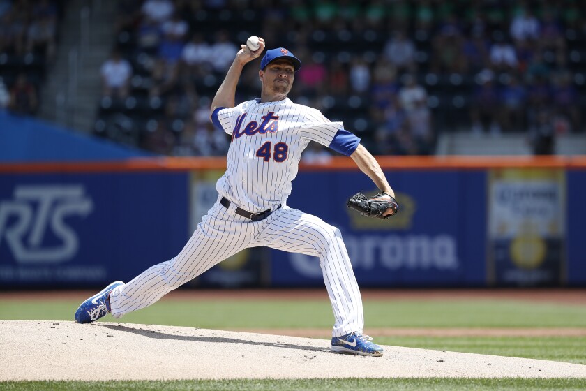 Jacob deGrom of the New York Mets pitches against the Padres in the first inning at Citi Field on Thursday.