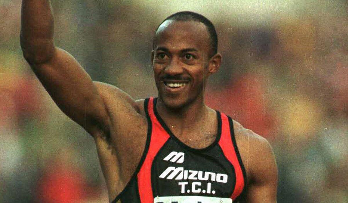Frankie Fredericks of Namibia smiles and waves to the crowd after winning the men's 200-meter final at the Bislett Games in 1996.