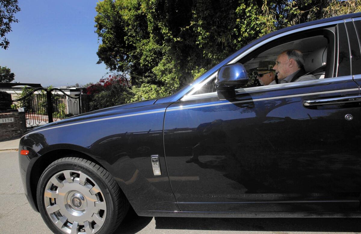 Jeff Hyland, a high-end real estate agent in Beverly Hills, gives columnist Steve Lopez a tour in his Rolls-Royce of some of the area's pricier properties.