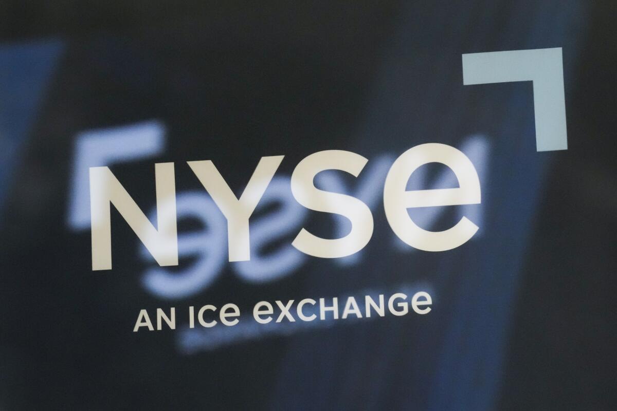 The NYSE logo is displayed on the floor at the New York Stock Exchange 