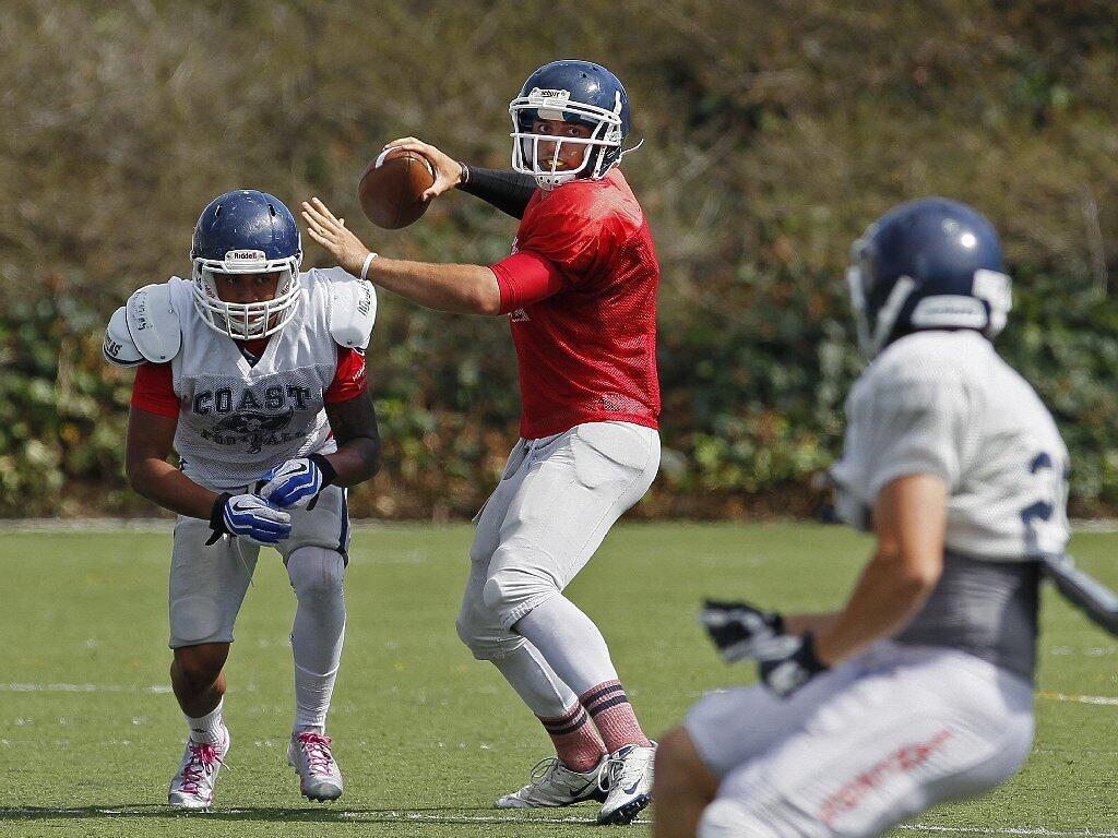 Orange Coast College's Cameron Biedgoly throws during an intrasquad scrimmage on Saturday.