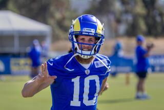 Irvine, CA - July 27: Rams wide receiver Cooper Kupp waves to fans during Rams training camp.