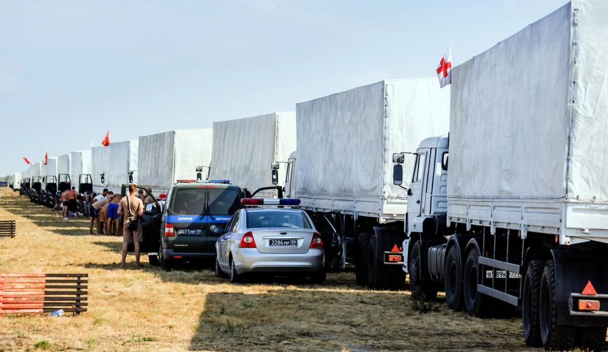 Trucks carrying Russian aid to separatist-held areas of eastern Ukraine park near the Russian city of Voronezh on Aug. 13, waiting for a standoff between Moscow and Kiev to end.