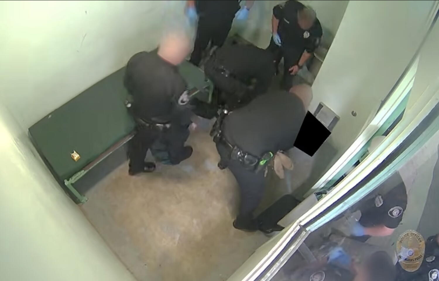 LAPD releases video of officers beating handcuffed jail inmate who later died