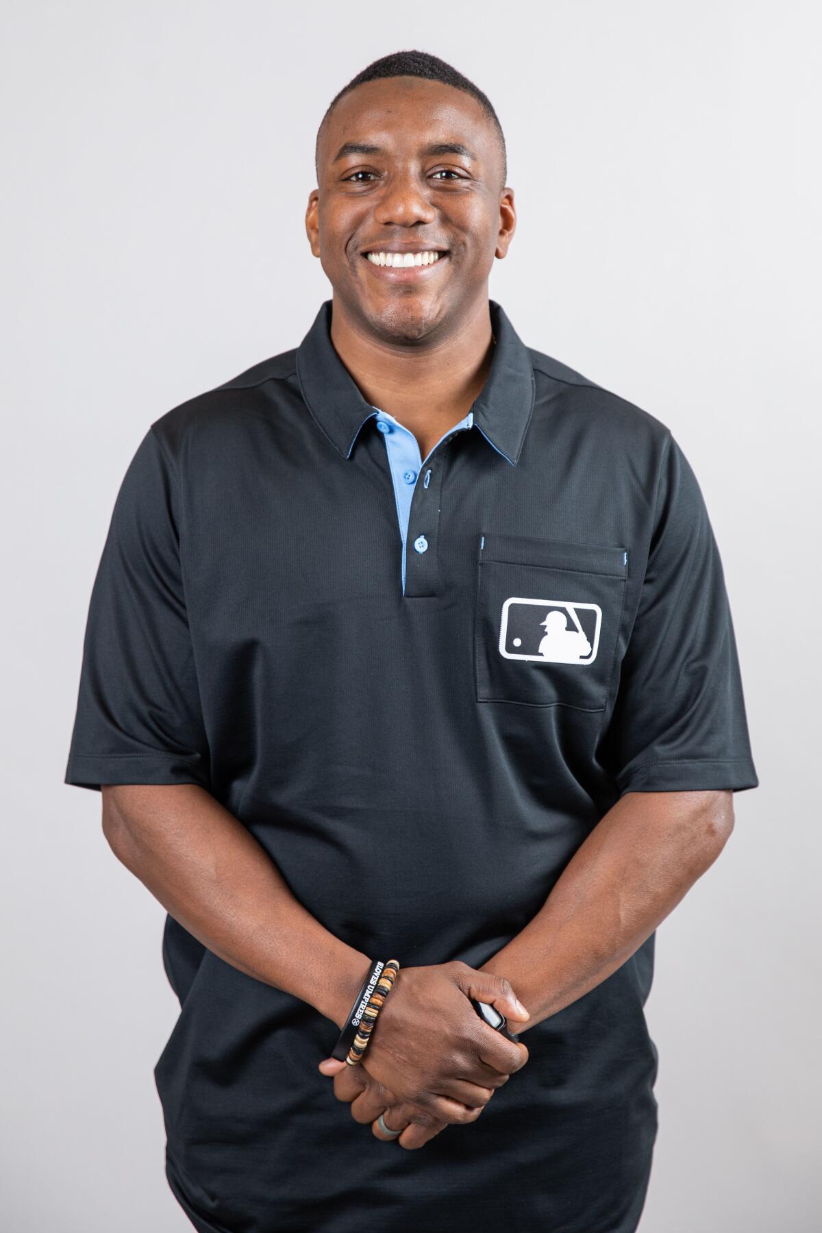 Rookie MLB umpire Malachi Moore knows about dealing with pressure