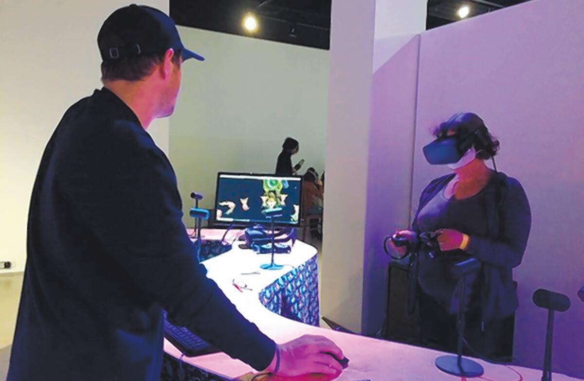 A guest gets connected to ‘Chocolate’ via VR. Wonderspaces Virtual Reality Showcase runs Nov. 30-Dec. 30, 2019 at San Diego Art Institute in Balboa Park, San Diego.