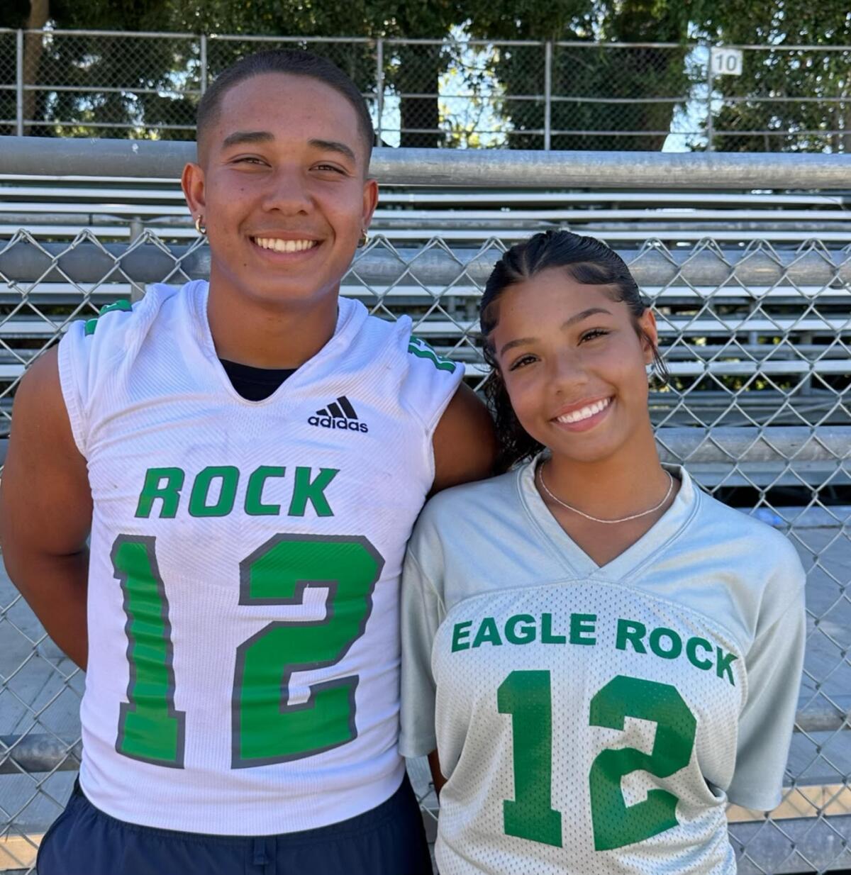 The brother-sister duo of Barry and Haylee Weatherspoon pose for a photo.