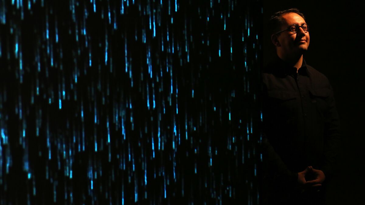 Artist Refik Anadol and his digital rain at Young Projects.