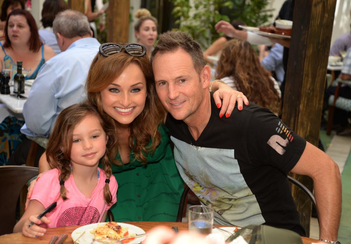 Celebrity chef Giada De Laurentiis announced split from husband Todd Thompson, right. Here, they are photographed with their daughter Jade, 6.