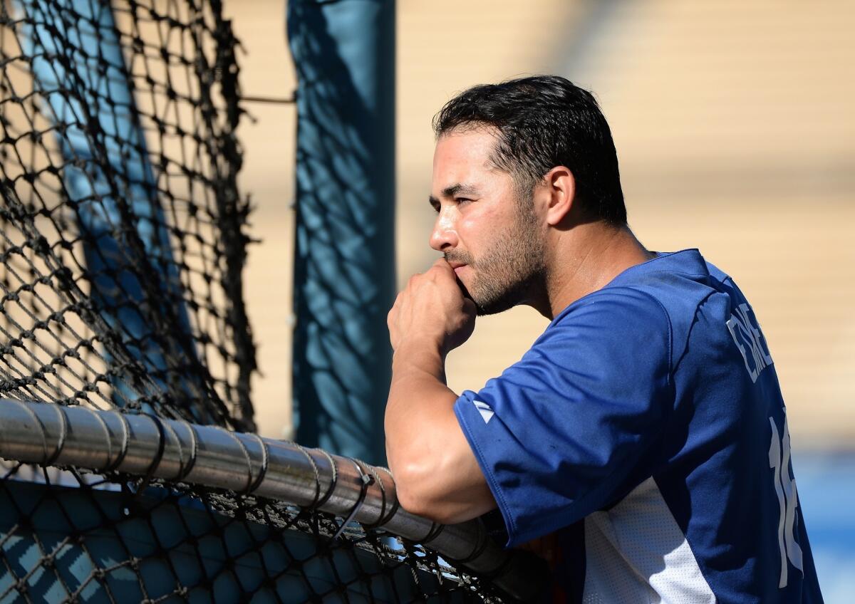 Andre Ethier watches batting practice on Monday. The Dodgers center fielder did not play Tuesday against the New York Mets because of tightness in his left calf.