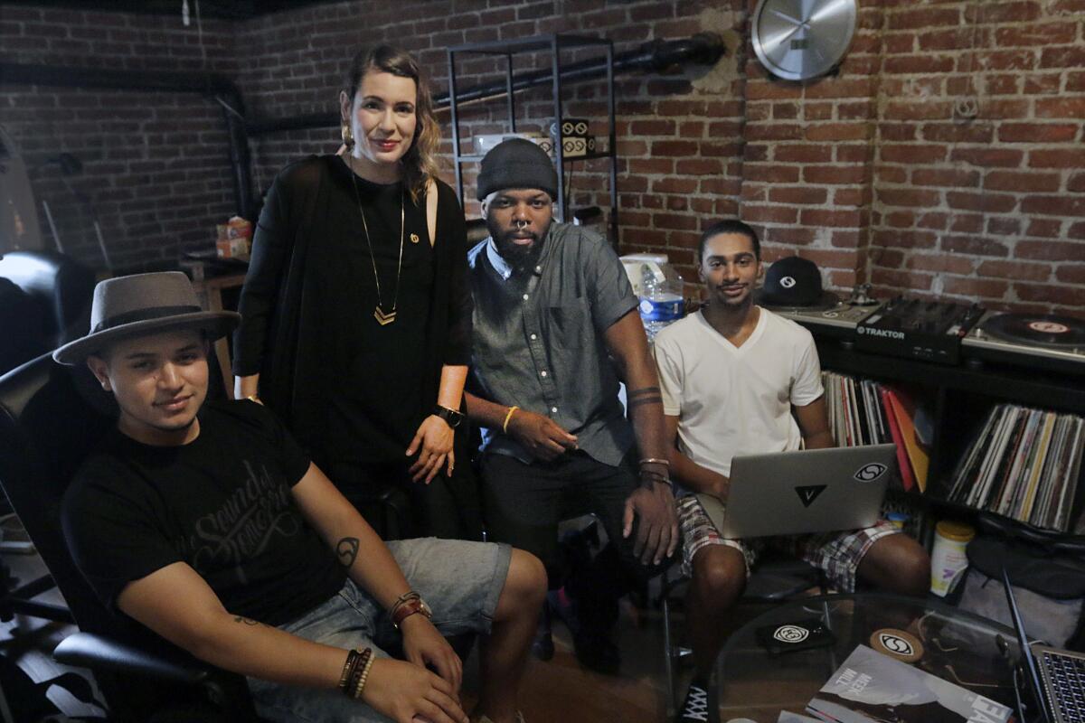 Members of Soulection in their Highland Park offices, from left, Joe Kay, Jacqueline Schneider, Andre Power and Montalis Anglade. The collective has just been picked up by Apple's new Beats One station.