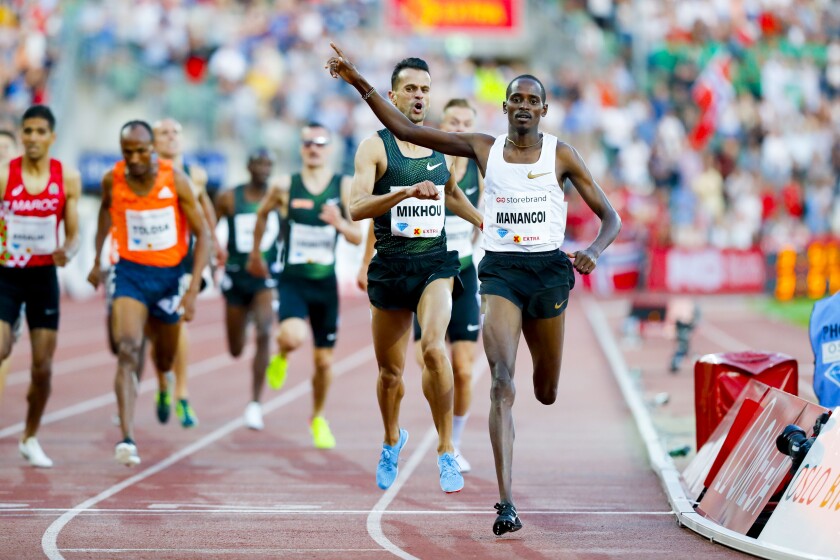 Elijah Motonei Manangoi of Kenya celebrates winning the men's mile race at the 2018 Bislett Games on June 7, 2018 in Oslo, Norway.