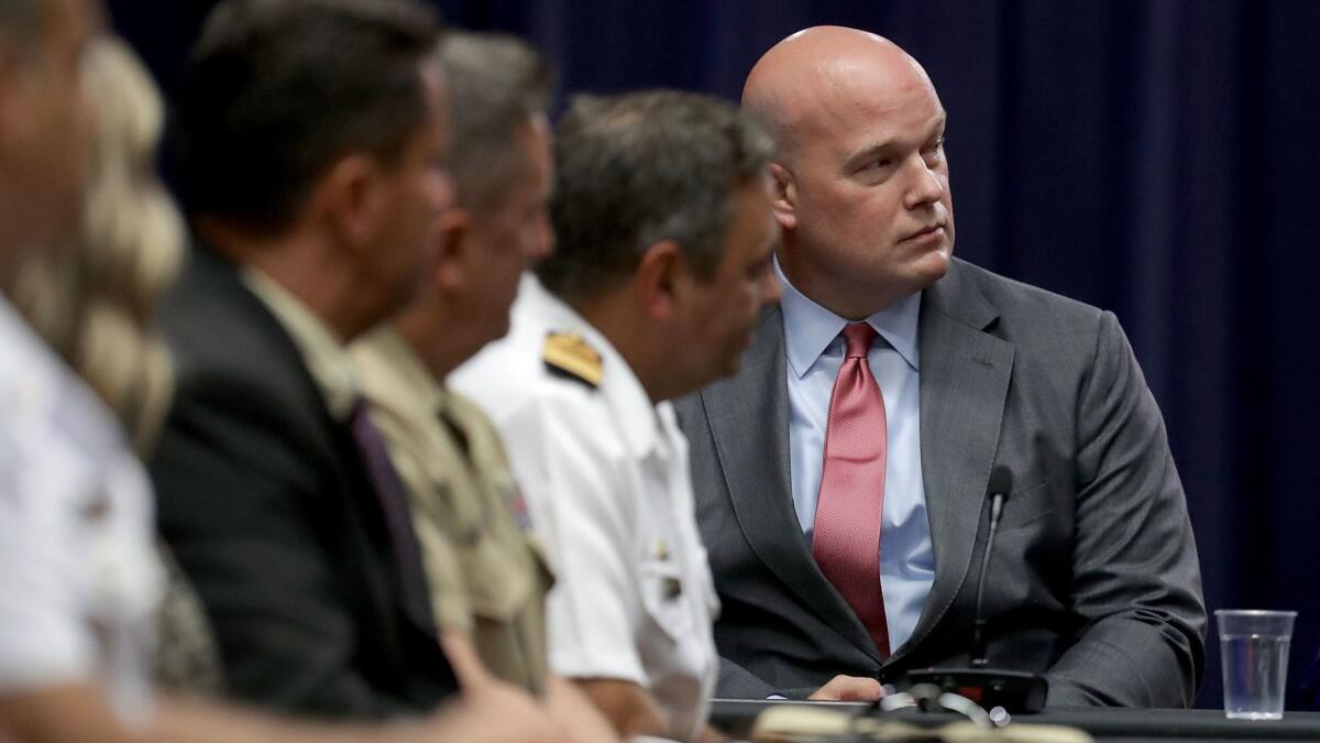 Matt Whitaker is under pressure to recuse himself from the Russia investigation while serving as acting attorney general.