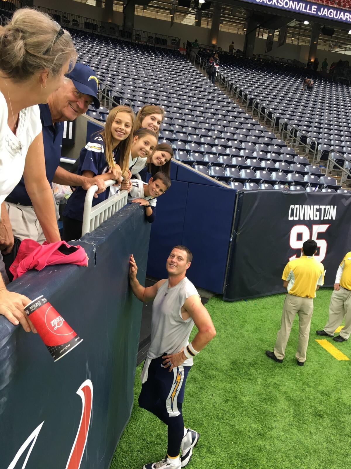Chargers' Philip Rivers poses for a photo for his family.