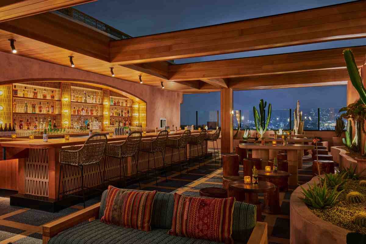 Bbar and lounge seating at the new Desert 5 Spot rooftop bar with a view of Hollywood.