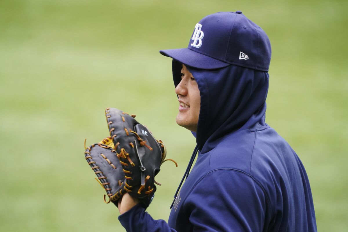 Tampa Bay Rays first baseman Ji-Man Choi warms up before Game 4 of the World Series.