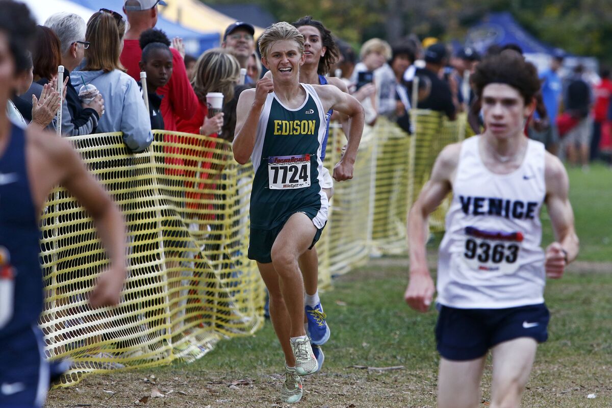 Edison's Wylie Cleugh sprints for the finish line during the Central Park Invitational on Saturday in Huntington Beach.