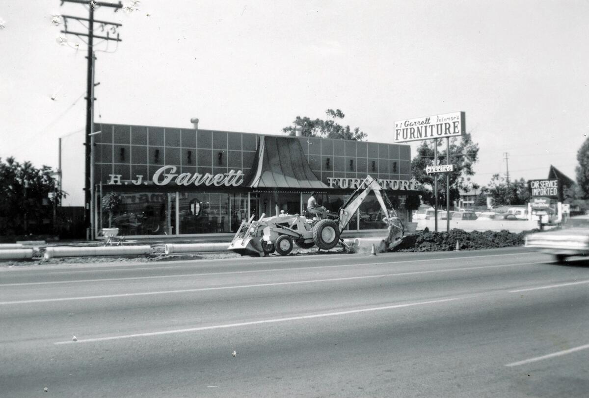H.J. Garrett Furniture, pictured in 1963, is closing its doors after more than five decades in business. “It’s been good to us over the years,” co-owner John Garrett said. “We’ve really enjoyed the business.”