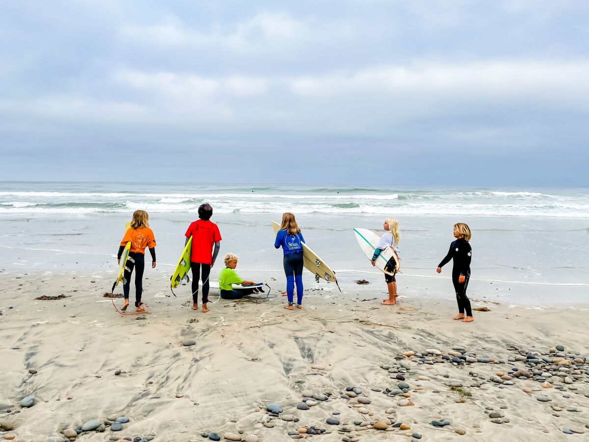 Surfers ready to get out on the water.