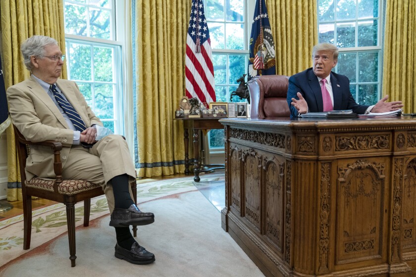 Senate Majority Leader Mitch McConnell in the Oval Office with President Trump.