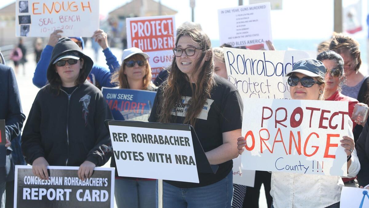Huntington Beach student Cleopatra Elrashidy speaks as a group of Orange County students, educators and others gathered Thursday in Huntington Beach to give Rep. Dana Rohrabacher an “F” for his positions on gun control.
