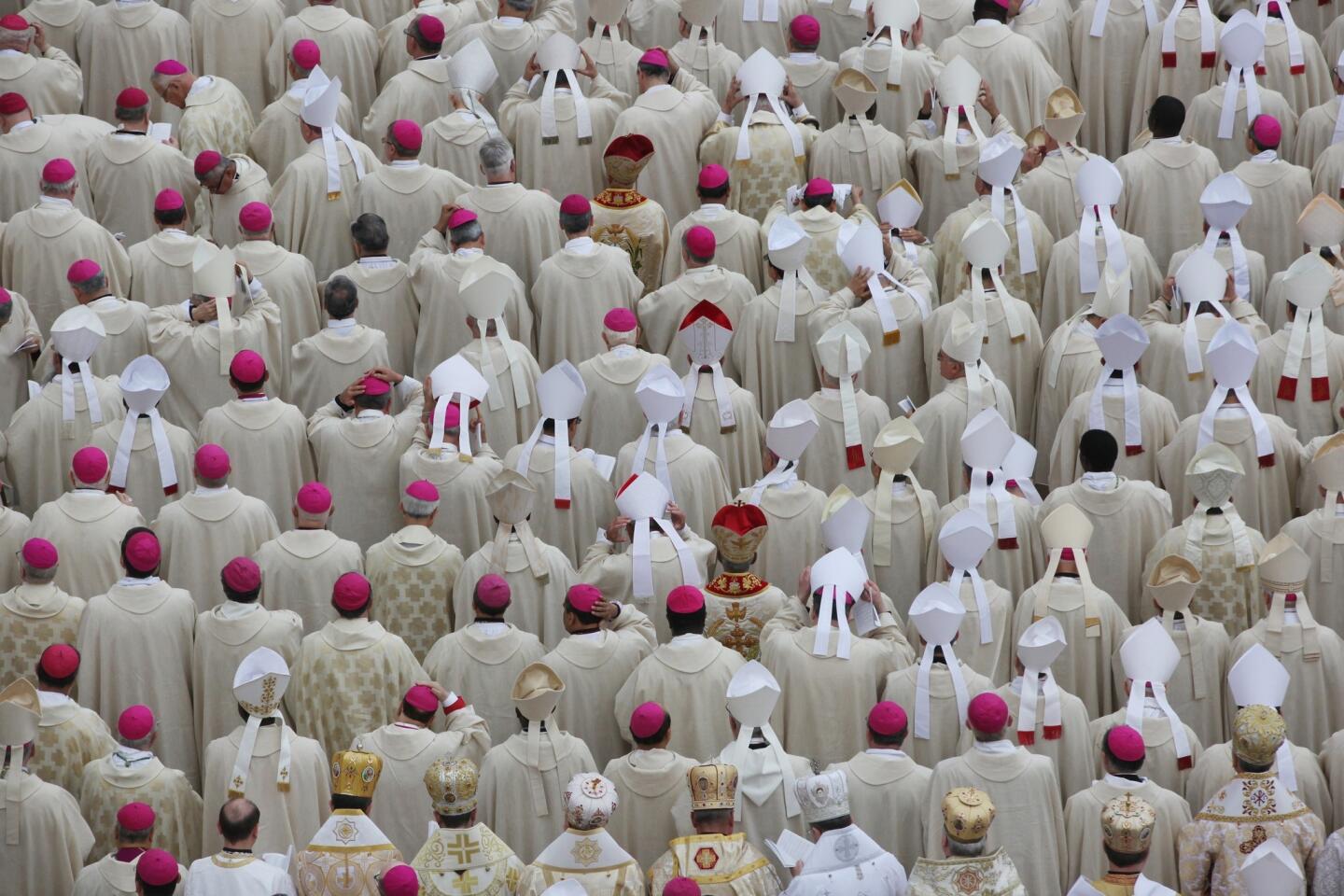 Bishops attend the canonization Mass for popes John XXIII and John Paul II at St. Peter's Square at the Vatican.