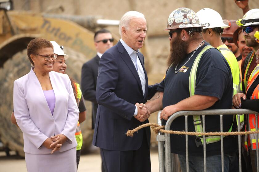 LOS ANGELES CA OCTOBER 13, 2022 - President Joe Biden, with mayoral candidate Karen Bass, visited a Metro subway construction site in Los Angeles Thursday, October 13, 2022, and tout federal investments aimed at bolstering the nation's infrastructure. (Irfan Khan / Los Angeles Times)