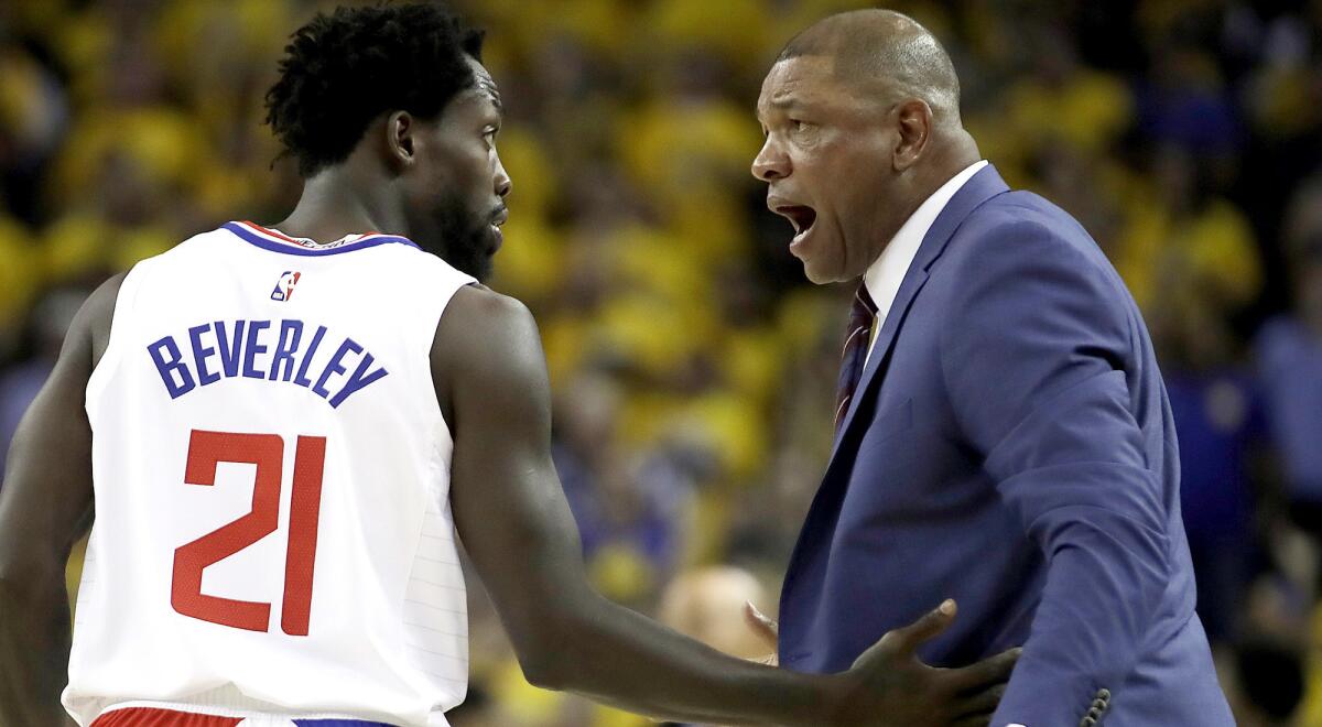 Veteran Patrick Beverley was called the heartbeat of a gritty Clippers team by coach Doc Rivers, right.