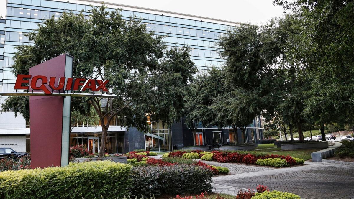 Equifax headquarters in Atlanta are shown. The firm has been pushing to repeal a federal regulation that upholds consumers' rights to sue.