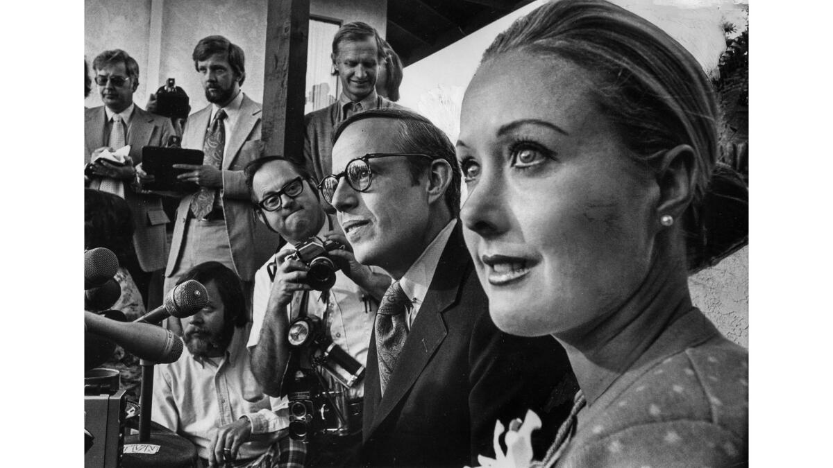 Jan. 15, 1975: John W. Dean III and wife, Maureen, meet reporters at their home. This photo appeared in the Jan. 16, 1975, Los Angeles Times.