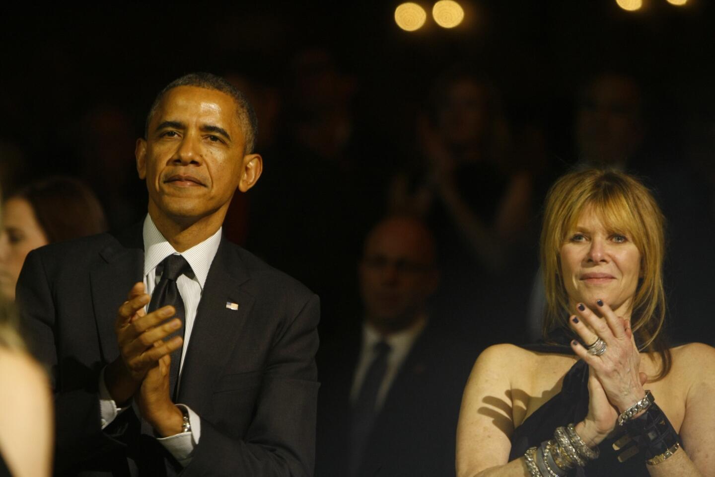 President Obama and Kate Capshaw, Steve Spielberg's wife, applaud Speilberg's speech during a Shoah Foundation event at the Hyatt Regency Century Plaza Hotel.