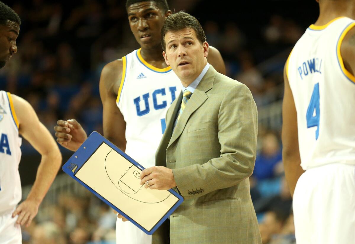 UCLA Coach Steve Alford talks to his team during a timeout in a game against UC Riverside on Dec. 10. The Bruins beat the Highlanders, 77-66.