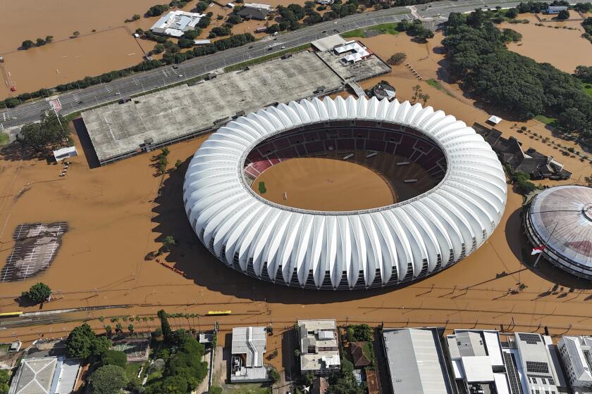The Beira Rio stadium and surrounding area is flooded after heavy rain in Porto Alegre, Rio Grande do Sul state, Brazil, Tuesday, May 7, 2024. (AP Photo/Carlos Macedo)