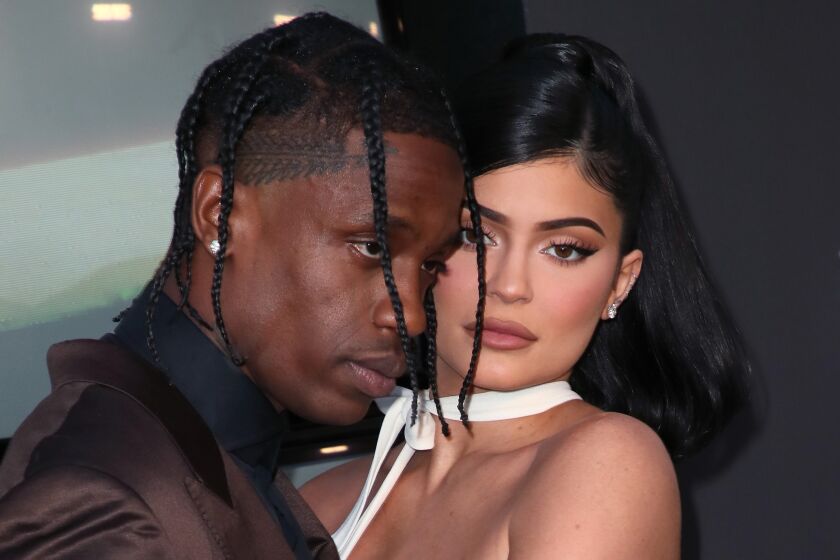 SANTA MONICA, CALIFORNIA - AUGUST 27: (L-R) Travis Scott and Kylie Jenner attend the premiere of Netflix's "Travis Scott: Look Mom I Can Fly" at Barker Hangar on August 27, 2019 in Santa Monica, California. (Photo by David Livingston/WireImage)